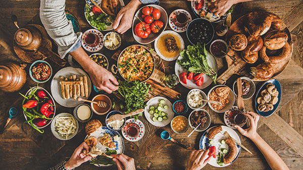 Flat-lay of Turkish family during traditional Middle Eastern breakfast